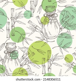 Seamless pattern with bamboo: bamboo stalk, bamboo leaves and bottle of bamboo essential oil. Cosmetic, perfumery and medical plant. Vector hand drawn illustration
