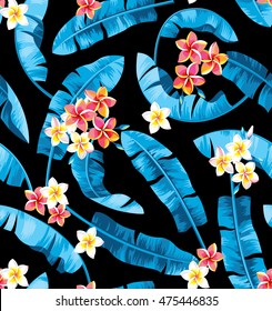 Seamless pattern with banana leaves and tropical flowers. Vector illustration.