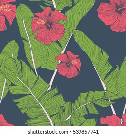 Seamless pattern with banana leaves, tropical flowers and geometrical  elements

