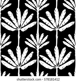 Seamless pattern of banana tree isolated on black background. Tropical wallpaper, textile print, exotic background.