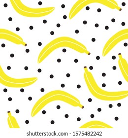 Seamless pattern with bananas hand-drawn on a white background,arranged in random order.Vector.
