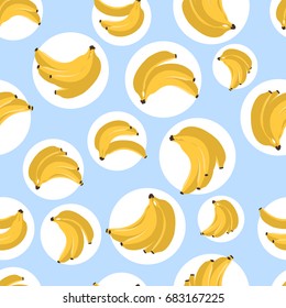 Seamless pattern with bananas. Vector illustration. Yellow banana on blue background. Textile print. Fabric print.