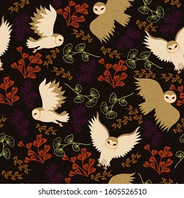 Seamless pattern with barn owls and twigs. Vector graphics.