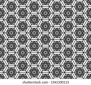 Seamless pattern based on Japanese geometric ornament.Black and white silhouette.Compound ornament.Hexagon grid.