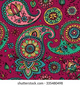Seamless pattern based on traditional Asian elements Paisley. Burgundy and green.