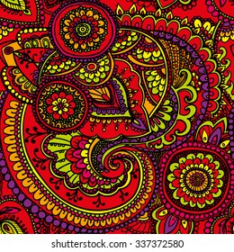 Seamless pattern based on traditional Asian elements Paisley. Red, yellow , orange . Bright colors.