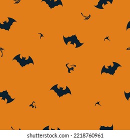 Seamless pattern with bat silhouette on orange background.
