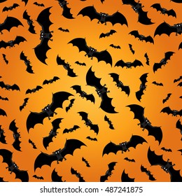 Seamless pattern with bats. Black bats on orange background. Background for Halloween. Vector illustration
