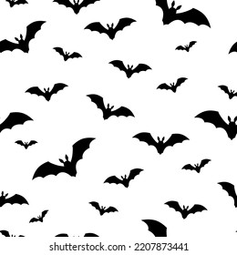 Seamless pattern with bats. Flock of bats. Hand drawn vector illustration. Isolated objects on white background.