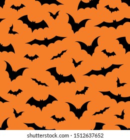 Seamless pattern with bats on orange background, vector illustration