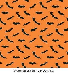 Seamless pattern with bats on orange background