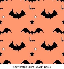 Seamless pattern with bats on a pastel background. Vector illustration