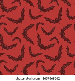 Seamless pattern. Bats on a red background. Great for Halloween and more.