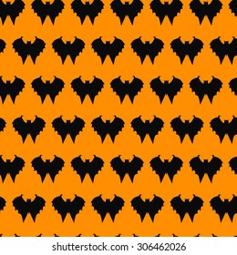 seamless pattern with bats, silhouette on an orange background