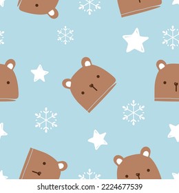 Seamless pattern with bear cartoons, snowflakes and hand drawn stars on blue background vector illustration. 