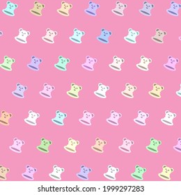 Patrón sin foco de un oso con varios colores sobre fondo rosado. Concepto de felicidad, alegría, celebración.