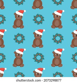 Seamless pattern of a bear in a Santa Claus hat and a Christmas wreath on a blue background. Flat vector illustration