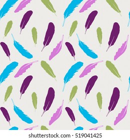 Seamless pattern with beautiful colorful feathers. Vector background.