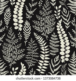 Seamless pattern with beautiful leaves on dark background. Vector illustration in vintage style.