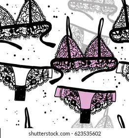 Seamless pattern beautiful lingerie. Drawing by hand in vintage style. Bra and panties. Beautiful lace. Handmade linen.