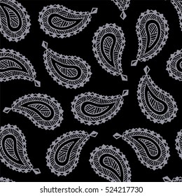 Seamless pattern of beautiful paisley cucumbers on a black background. Turkish, Indian, Persian. Vector illustration