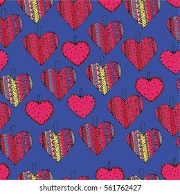 seamless pattern with beautiful pink hearts ornamented with curls and lace-up hand-drawn on a blue background. Suitable for cute wrapping paper for gifts for Valentine's day