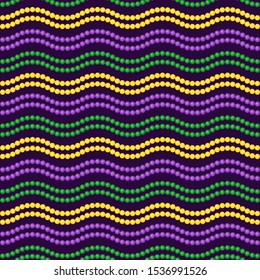 Seamless pattern beautiful yellow, green, purple beads on a dark background. Mardi Gras Party. Venetian carnival mardi gras party.  Vector Design with carnival symbol 