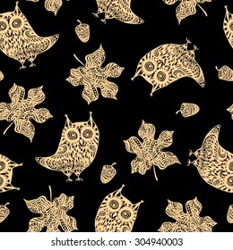 seamless pattern with beige owls and maple leaves on the black background