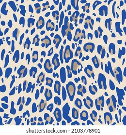 Seamless pattern beige and royal blue leopard print Stockvektor