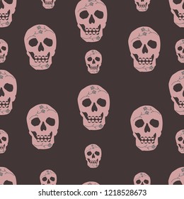 Seamless pattern of beige skulls with flowers on a beige background