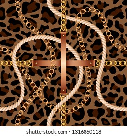 Seamless pattern with belts, chains and rope on leopard skin background
