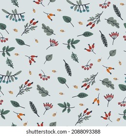 Seamless pattern with berries, leaves, acorns on blue background. Autumn concept