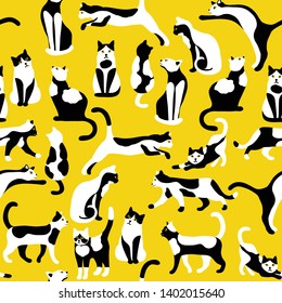 Seamless pattern with bicolor cats