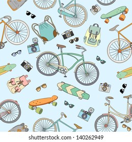 Seamless pattern with bicycles, boards and accessories