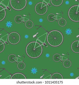 Seamless pattern from bicycles and flowers on a green background