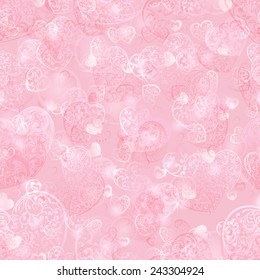 Seamless pattern of big and small hearts with curls, in light pink colors