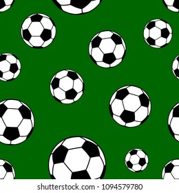 Seamless pattern of big soccer balls on green background