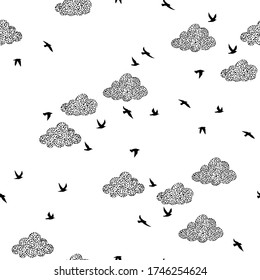 Seamless pattern with birds and clouds