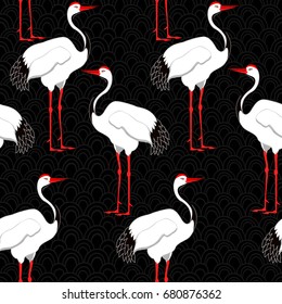 Seamless pattern with birds. Crane. Heron. Japanese pattern. Ornament with oriental motifs. Vector.