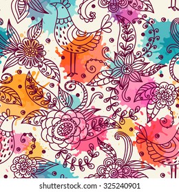 Seamless pattern with birds and flowers. Freehand drawing