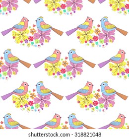 Seamless pattern with birds and flowers on a white background