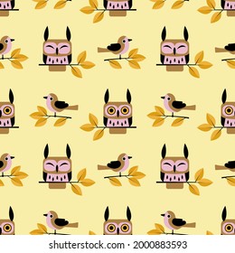 seamless pattern with birds. owls and small birds are sitting on the branches. autumn color. vector illustration