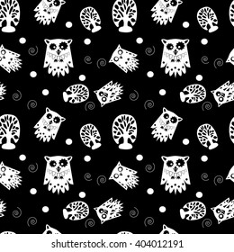 Seamless pattern with birds and tree for wallpaper, fabric, interior or any another background designs. Silhouettes of white owls and trees on black background. Vector