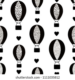 Seamless pattern with black Air Balloons icons and hearts on the white background. Vector illustration