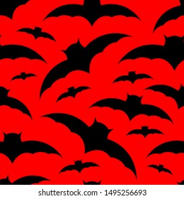 Seamless pattern. Black bats on a red background. Vector drawing. Halloween texture.