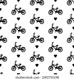 Seamless pattern with black bicycles and hearts. Vector illustration