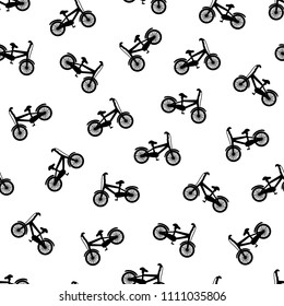Seamless pattern with black bicycles on the white background. Vector illustration