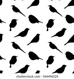 Seamless pattern with black birds silhouettes on white background. For textile, fabric, scrap paper, etc.
