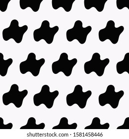 Seamless pattern with black blots on a white background. Vector illustration.