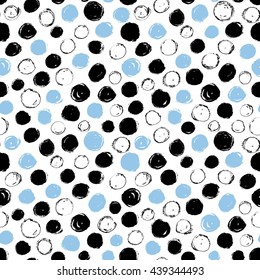 Seamless pattern with black and blue circles. Polka dots pattern. Ink illustration. Hand drawn artistic elements. Ornamental texture for your wrapping paper.